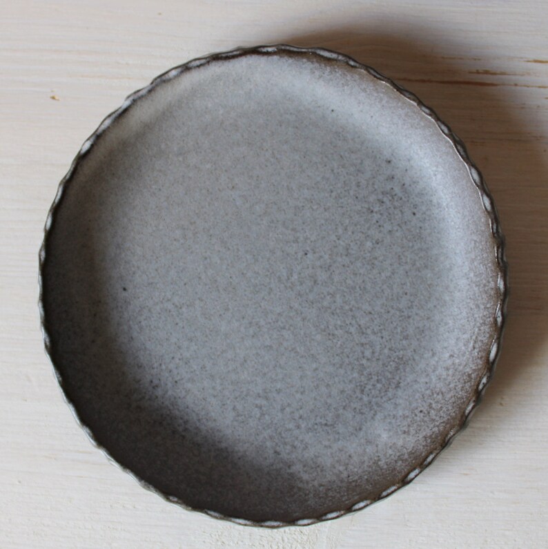 Set of four plates Small ceramic plates