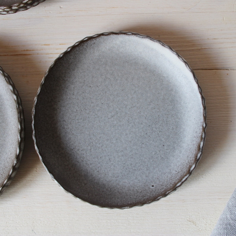 Set of four plates Small ceramic plates