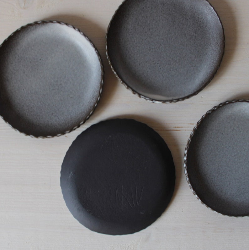 Set of four plates Small ceramic plates