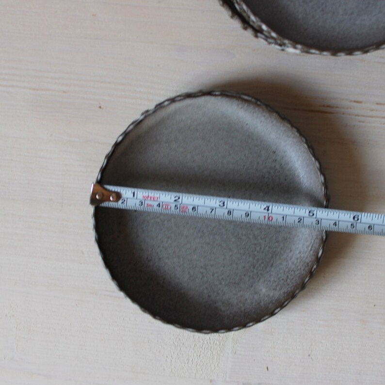 Set of four plates Small ceramic plates