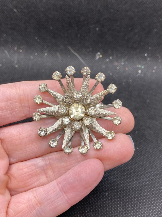 Starburst pin sale