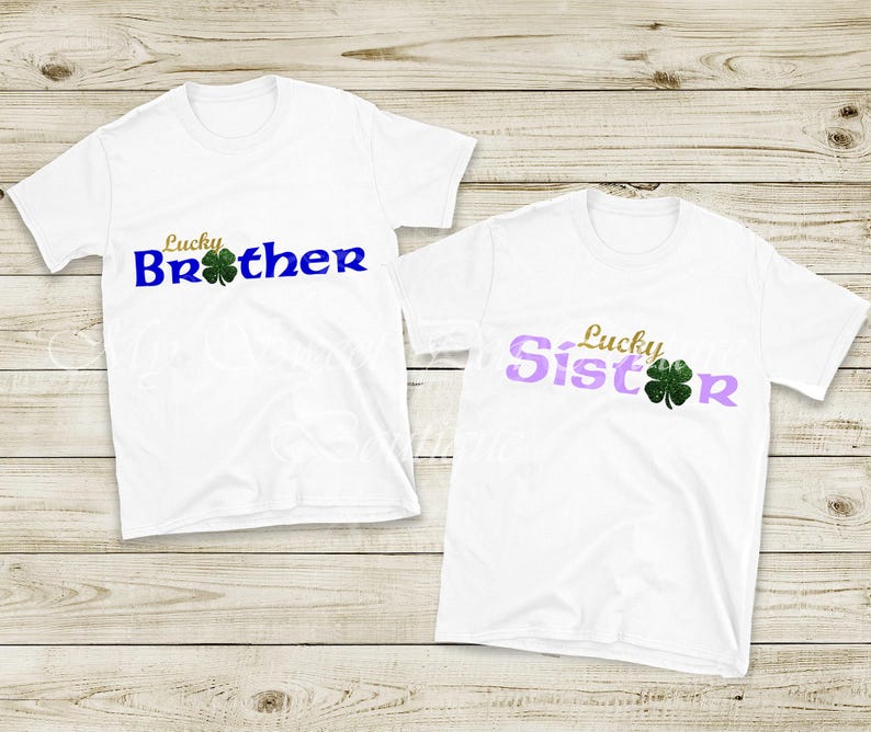 Two white t-shirts with the text "Lucky Brother" and "Lucky Sister" printed on them, along with a clover leaf symbol.