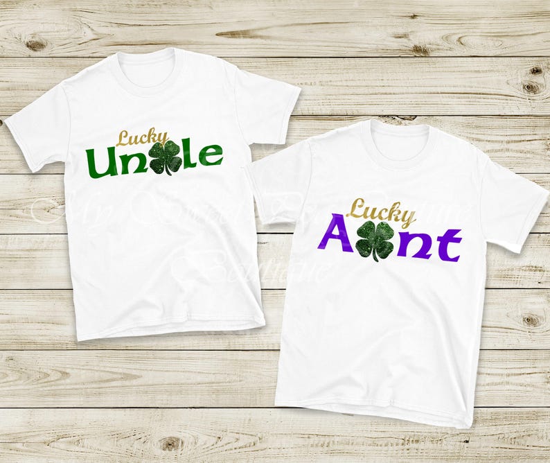 Two white t-shirts with the text "Lucky Uncle" and "Lucky Aunt" printed on them, along with a four-leaf clover symbol.