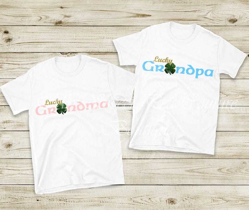 Two white t-shirts with the text "Lucky Grandma" printed on them, along with a four-leaf clover symbol.