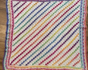 Handmade Crocheted Baby Blanket: White With Rainbow Varieted Yarn, Corner to Corner Pattern