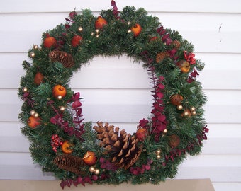 Christmas wreath with fruit accents