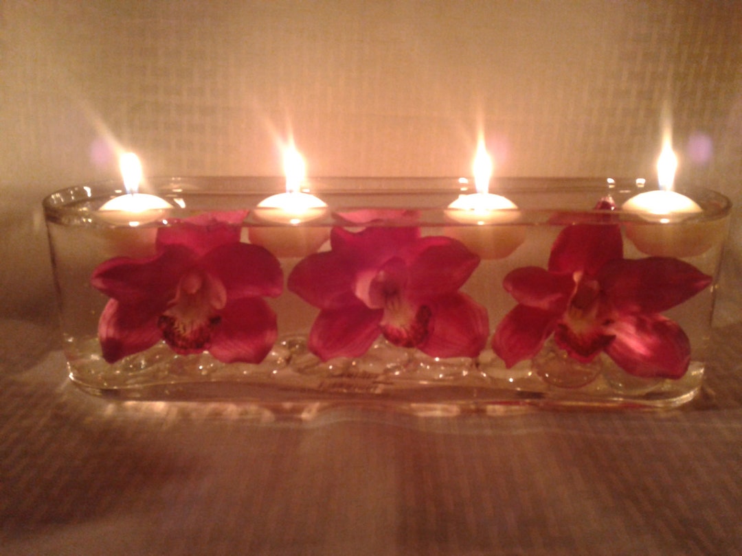 Long Glass Vase With Large Purple Flowers, Crystals, and Floating