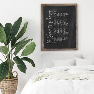 May include: Black and white text on a wooden framed chalkboard sign with the text "The Serenity Prayer" and a prayer about accepting things you cannot change, courage to change things you can, and wisdom to know the difference.