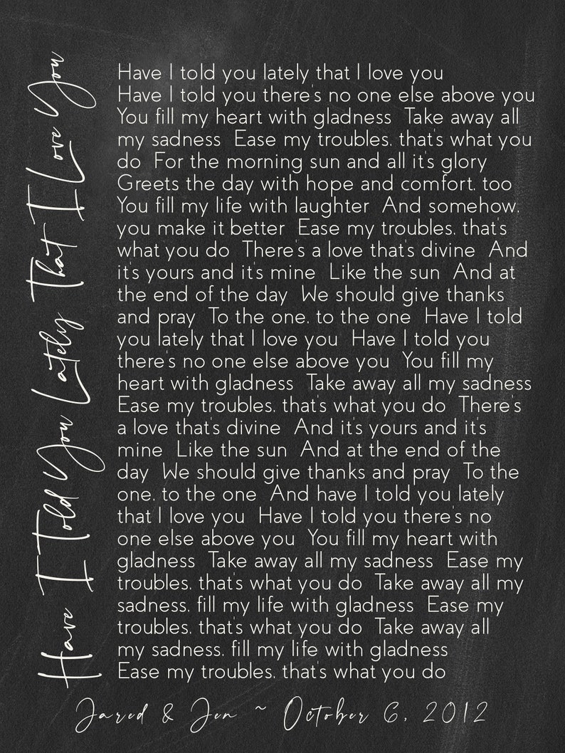 May include: Black and white chalkboard with a handwritten love letter. The text reads "Have I told you lately that I love you... You fill my heart with gladness... Ease my troubles. That's what you do." The letter is signed "Jared & Jon ~ October 6, 2012".