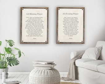 May include: Two framed prints with a rustic wood frame. The prints are on a white background with black text. The text on the left print reads "AA Morning Prayer" and the text on the right print reads "AA Evening Prayer".