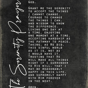 May include: Black and white text on a dark grey background. The text is a prayer for serenity, asking for the strength to accept things that cannot be changed, the courage to change things that can, and the wisdom to know the difference. The text ends with "Something Promised."