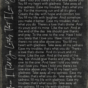May include: Black and white typography on a dark gray background with the text "Have I Told You Lately That I Love You" and a wedding date of "October 6, 2012".