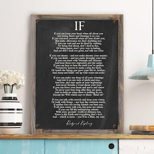 May include: Black and white framed print with a poem titled "IF" by Rudyard Kipling. The poem is printed on a black background with white text. The poem is about the importance of perseverance, integrity, and self-reliance.