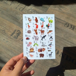 Cartão postal ABC animais de volta às aulas em casa