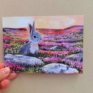 Cartolina Cartolina di Pasqua Coniglietto di coniglio nella brughiera