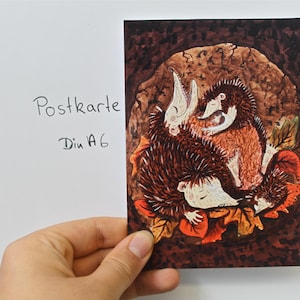 Postkarte "Igelfamilie im Winterschlaf"