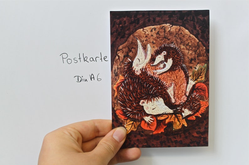 Postcard Hedgehog family in hibernation image 1