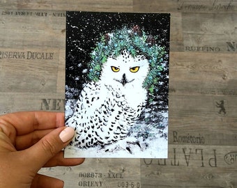 Postcard snowy owl with fir wreath