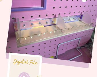 May include: A pink pegboard with a clear acrylic shelf and dividers. The shelf has a scalloped edge. The image also includes the text "Digital File" and the website "glopezcreations.com".