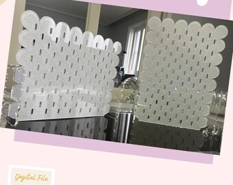 May include: Two clear, glittery pegboards with scalloped edges. Each board has rows of small, evenly spaced holes. The pegboards are displayed on a reflective surface, with a soft pink and white background. The image includes the text "Digital File Pegboard".
