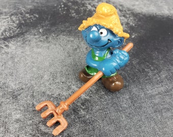 1982 Gardener (Farmer) Smurf with Rake by Peyo Collectible Figure