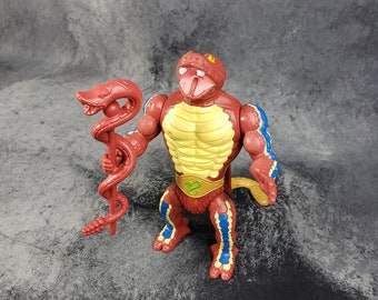 1980's MOTU Rattlor Action Figure with Staff