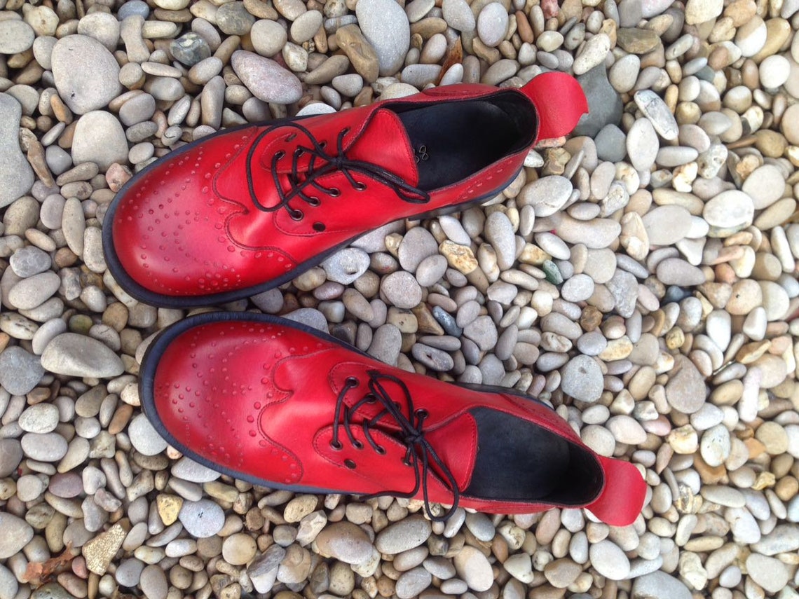 daria snakeskin bootie