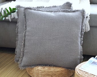 gray fringe pillow