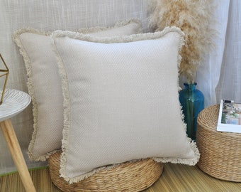 white fringe throw pillow