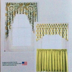 May include: Two window valances with a yellow and white polka dot pattern and a green and white floral pattern. The valances are shown with a matching green curtain.