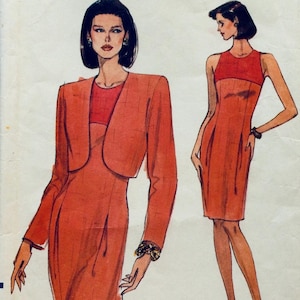 Puede incluir: Una ilustración de patrón de costura que presenta a dos mujeres con un vestido y una chaqueta a juego. El vestido y la chaqueta son de un color naranja vibrante. La ilustración está sobre un fondo blanco.