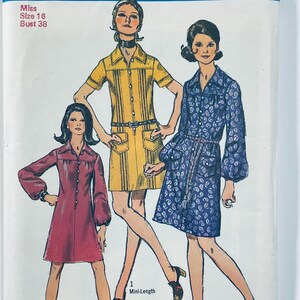 May include: A vintage sewing pattern featuring three women wearing different styles of mini dresses. The pattern is for a size 16, bust 38. The dresses are in yellow, red, and blue with various patterns.