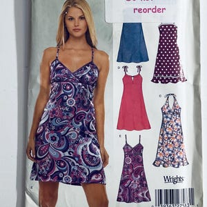 May include: A woman in a purple paisley print dress with thin straps. The image also displays dress patterns, including a blue denim dress, a red dress, and a floral halter dress. The word "reorder" is visible at the top of the image.