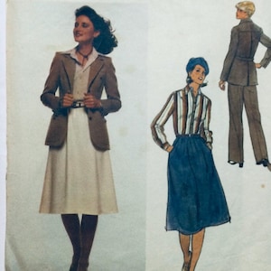 May include: A vintage sewing pattern featuring three women's outfits. The first outfit is a brown blazer with a white skirt. The second outfit is a striped shirt with a blue skirt. The third outfit is a brown pantsuit.