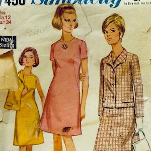 May include: Vintage sewing pattern for a dress and jacket. The pattern is for a woman's dress with short sleeves and a jacket with a plaid pattern. The pattern is from the 1960s and is in good condition.