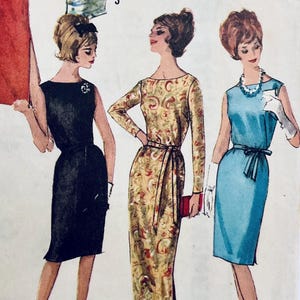 May include: A vintage fashion illustration depicting three women in dresses. The dresses include a black sleeveless dress, a long-sleeved paisley dress, and a blue sleeveless dress. The illustration showcases classic mid-century dress styles, with each dress having a unique silhouette.