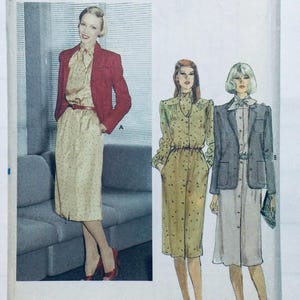May include: A vintage sewing pattern featuring three women wearing different styles of dresses and jackets. The pattern includes a long-sleeved dress with a collar and a belt, a long-sleeved dress with a collar and a belt, and a jacket with a collar and pockets. The pattern is labelled "A" and "B".