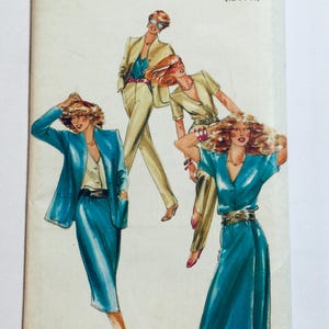 May include: Illustration of three women wearing different outfits. The woman on the left is wearing a blue blazer and skirt. The woman in the centre is wearing a beige pantsuit. The woman on the right is wearing a blue dress.