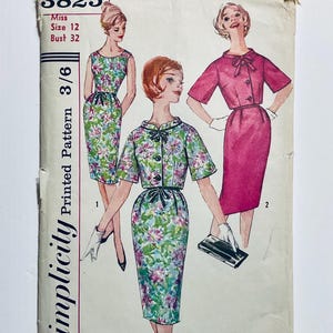May include: Vintage Simplicity sewing pattern with three dress designs. The illustrations depict dresses with different necklines, sleeve lengths, and skirt styles. The pattern includes a floral print dress, a solid pink dress, and a two-piece floral ensemble. The text reads "Miss Size 12 Bust 32".