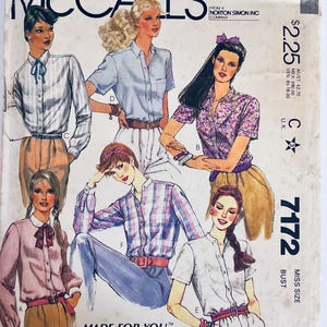 May include: Vintage McCall's sewing pattern envelope featuring illustrations of women's blouses. The envelope has the text "McCall's" and "7172" with a price of $2.25. The illustrations depict various blouse styles with different colors and patterns.