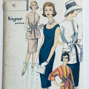 May include: Vogue pattern sewing pattern featuring four different dress designs. The pattern is for a dress with a skirt and a jacket, a sleeveless dress, a dress with a jacket, and a dress with a skirt. The pattern is printed on a white background with black text.
