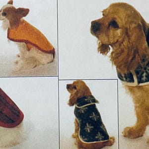 May include: Several dogs wearing different coats are shown in this image. One dog wears a red and black plaid coat, while another wears an orange coat. A third dog is wearing a navy blue coat with white snowflake designs.