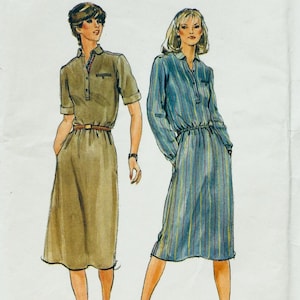 May include: Two women's dresses, one in a khaki color with a button-down front and a belt, and the other in a blue and white striped pattern with a button-down front and a drawstring waist.
