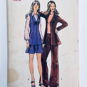 May include: Vintage sewing pattern illustration showing two women in 1970s outfits. One wears a blue vest dress with a floral blouse, the other a burgundy suit. The pattern is for bust size 36.