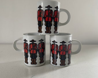 Vintage Marc Tetro Danesco Canadian Mounties mug set / Royal Canadian MP home decor /colorful graphic mugs