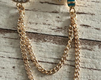 Vintage gouden truiclips: vestkraagbroche, sjaalpin