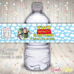 May include: Water bottle label with a blue background and white clouds. The label features a cartoon image of Buzz Lightyear from the Toy Story movie franchise. The text on the label reads "Two Infinity & Beyond Jeffrey's 2nd Birthday".