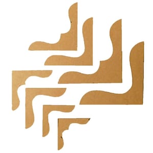 May include: A set of six brown cardboard corner brackets with a decorative, curved design. The brackets are arranged in a staggered pattern.
