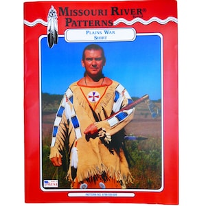 May include: A sewing pattern for a Plains War Shirt. The pattern features a man wearing a tan shirt with blue and white trim, fringe, and a cross on the chest. The pattern is from Missouri River Patterns.