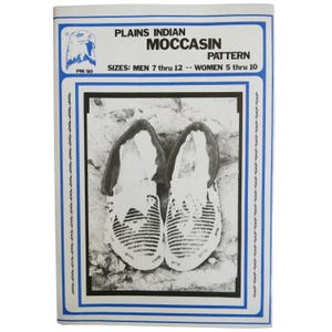 May include: Black and white image of a pattern for making moccasins. The pattern is for sizes 7 through 12 for men and 5 through 10 for women. The text on the pattern reads "Plains Indian Moccasin Pattern".